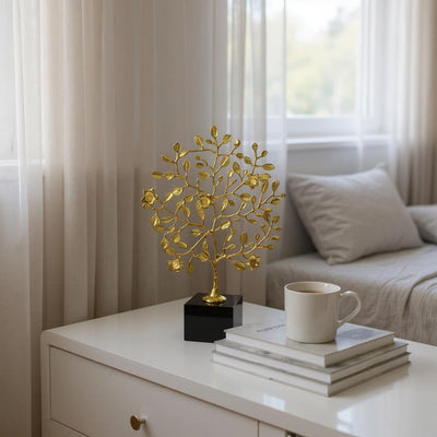 Golden Metallic Leaf Sculpture on Black Base