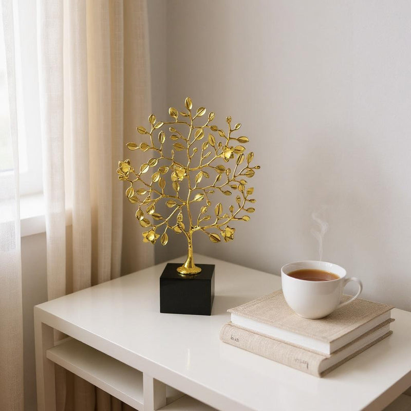 Golden Metallic Leaf Sculpture on Black Base